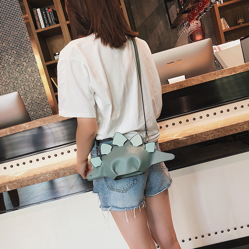 “DINO BABE” Softshell Crossbody – White & Sky Spikes