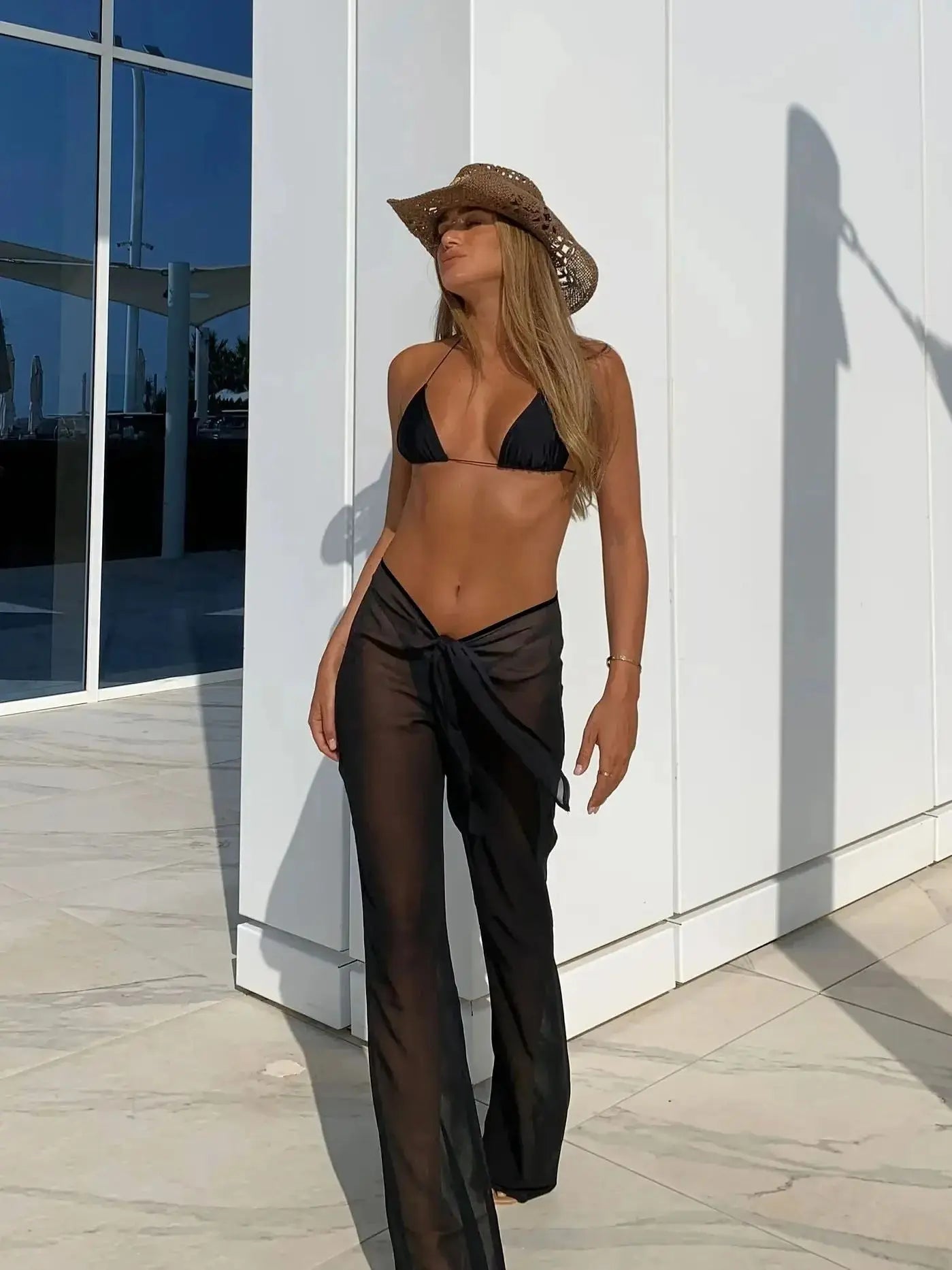 2025 Elegant Black Bikini Set with Transparent Bottoms Urban Style Beachwear White Wall Lightweight and Breathable Summer Beach