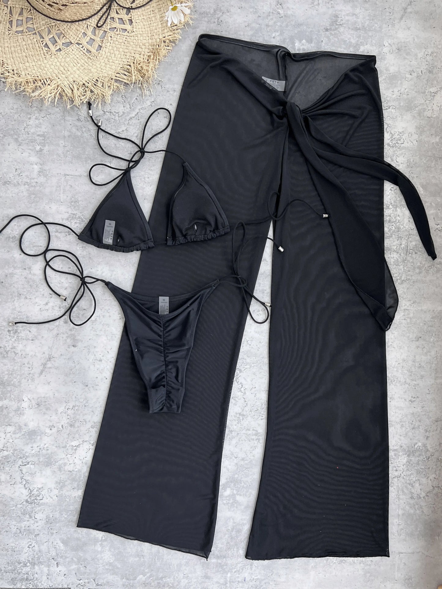 2025 Elegant Black Bikini Set with Transparent Bottoms Urban Style Beachwear White Wall Lightweight and Breathable Summer Beach