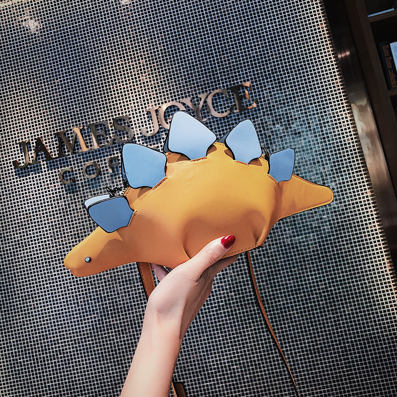 “DINO BABE” Softshell Crossbody – White & Sky Spikes