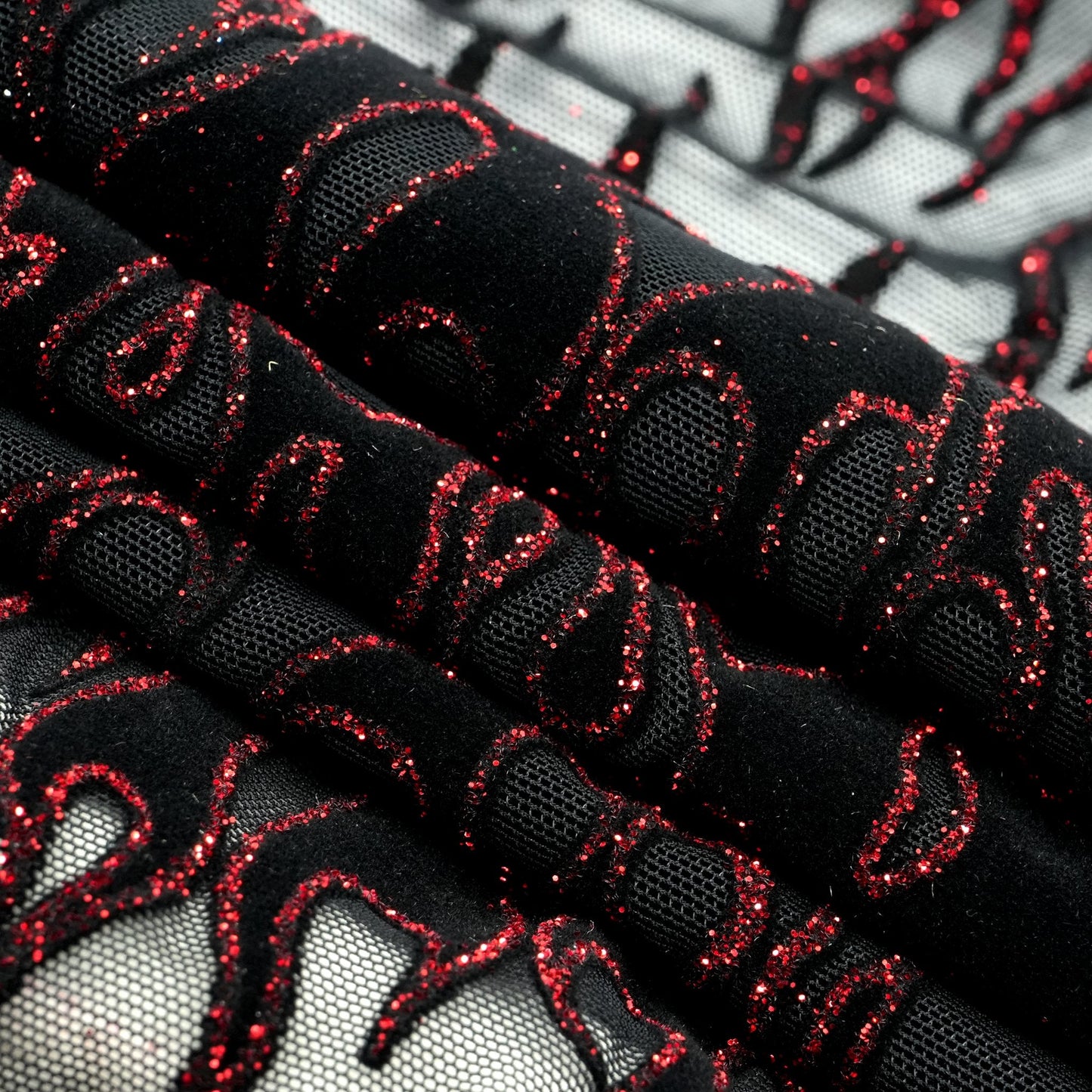 Fiery Glittered Flocked Stretch Mesh Fabric | Blue Moon Fabrics